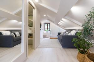 Giường trong phòng chung tại Ático tipo loft en San Sadurniño.