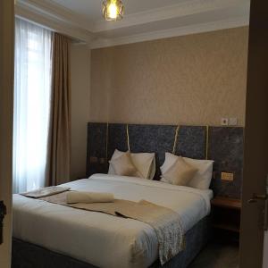 Postel nebo postele na pokoji v ubytování Serene homes