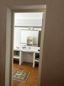 a bathroom with a sink and a mirror at Gorgeous Apartment in Jesús in Nuestra Señora de Jesus +34 photos