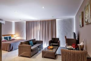 Χώρος καθιστικού στο Luxury Studio Black Durgeon at Den Laman