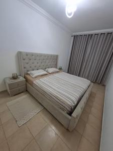 Postel nebo postele na pokoji v ubytování Jolie Appartement Marina Saidia ap4