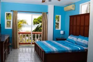 מיטה או מיטות בחדר ב-Sabas Beach Resort