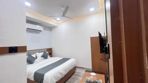Postel nebo postele na pokoji v ubytování Hotel Nest Icon