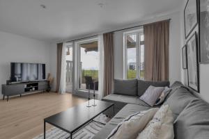 Et tv og/eller underholdning på Central and modern apartment in Tromsø