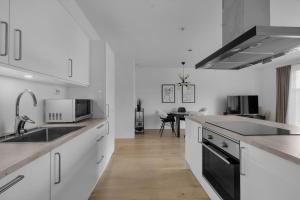 Køkken eller tekøkken på Central and modern apartment in Tromsø