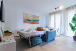 Μια τηλεόραση ή/και κέντρο ψυχαγωγίας στο Appartamento Viserba MareVerde Relax e Comodità