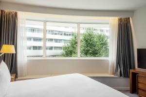 Posteľ alebo postele v izbe v ubytovaní DoubleTree by Hilton Wroclaw
