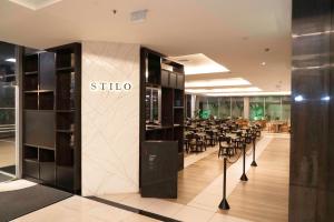 Ресторант или друго място за хранене в Laghetto Stilo Barra