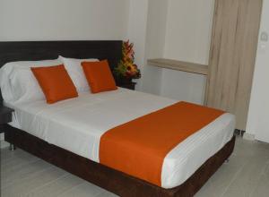 Postel nebo postele na pokoji v ubytování Massay Hotel