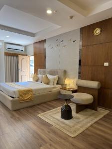 Postel nebo postele na pokoji v ubytování Hotel Horizon International