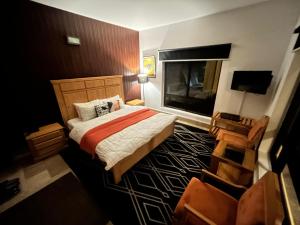 Giường trong phòng chung tại Trout Lodges Naran +27 ảnh