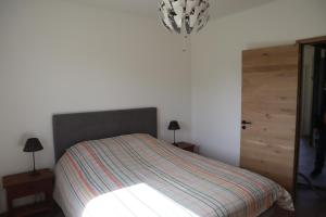 Postel nebo postele na pokoji v ubytování Belle Maison, calme avec parking