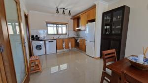 Kuchyň nebo kuchyňský kout v ubytování Apartment Melodia do Mar + 20 fotografií