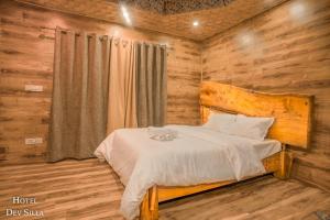 Postel nebo postele na pokoji v ubytování Dev Silla + 2 fotografie
