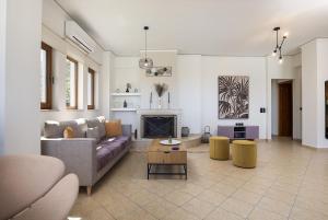 Χώρος καθιστικού στο Villa Aspa