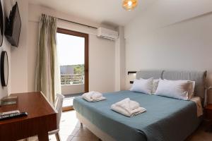 Ένα ή περισσότερα κρεβάτια σε δωμάτιο στο Villa Aspa +29 φωτογραφίες