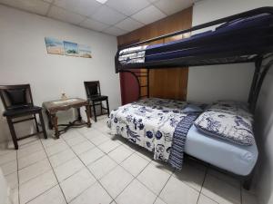 Postel nebo postele na pokoji v ubytování Azucar Miami