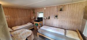 Кровать или кровати в номере Telemark Camping +72 фотографии