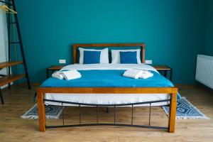 Giường trong phòng chung tại Hotel Mountime Kazbegi