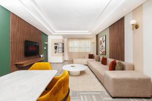 Μια τηλεόραση ή/και κέντρο ψυχαγωγίας στο 3BR Modern Stay in Heart of Rabat