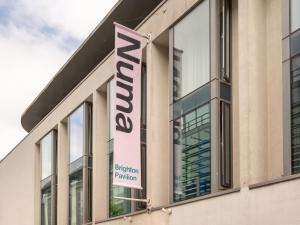 a sign on the side of a building at Numa Brighton Pavilion in Brighton & Hove