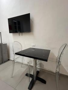 TV a/nebo společenská místnost v ubytování Studio d'Art - Centro Storico di Arezzo