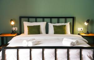 Giường trong phòng chung tại Hotel Mountime Kazbegi