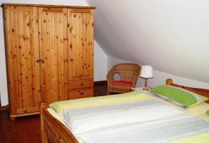 Postel nebo postele na pokoji v ubytování Ferienhaus Siemer 'Altes Backhaus'