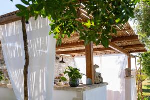 A garden outside Masseria Capece bed & breakfast