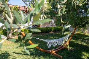 A garden outside Masseria Capece bed & breakfast