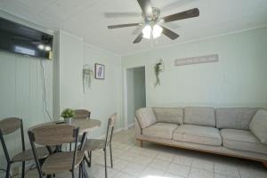 a living room with a couch and a table at Cozy 1st Floor apt blocks from Beach Boardwalk 1 in Wildwood