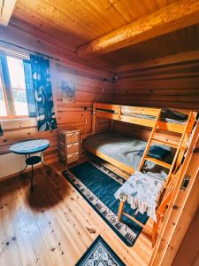 an overhead view of a bedroom with a bunk bed in a cabin at Bonnänga in Rottneros +7 photos