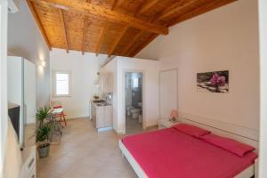 A bed or beds in a room at Masseria Capece bed & breakfast