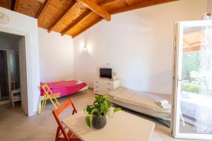 A bed or beds in a room at Masseria Capece bed & breakfast