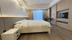 TV i/ili multimedijalni sistem u objektu 富丽&北京世茂国际服务式公寓
