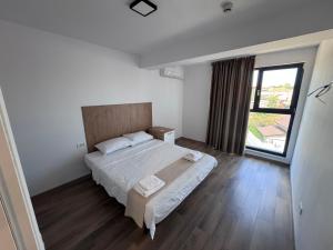 Katil atau katil-katil dalam bilik di Aparthotel Techirghiol