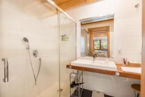 a bathroom with a sink and a shower at Casa Guillem 3 in Tavascan +17 photos