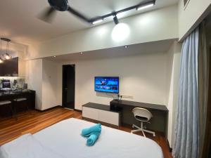 TV a/nebo společenská místnost v ubytování Sunway Resort Suite direct access to Mall & Lagoon