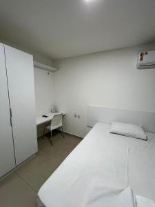 Postel nebo postele na pokoji v ubytování Seller Residence Centro