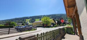 a stop sign on the side of a street at Planaiblick by Alpenidyll Apartments in Schladming