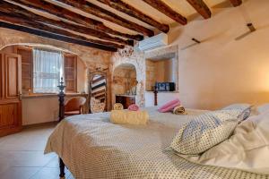 a bedroom with a large bed in a room at Na Corma Nova by dracmallorca in Calonge +39 photos