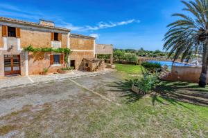 an external view of a house with a swimming pool at Na Corma Nova by dracmallorca in Calonge