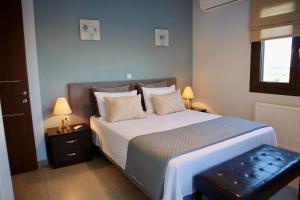 Ένα ή περισσότερα κρεβάτια σε δωμάτιο στο Villa Serenity +48 φωτογραφίες