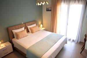 Ένα ή περισσότερα κρεβάτια σε δωμάτιο στο Villa Serenity