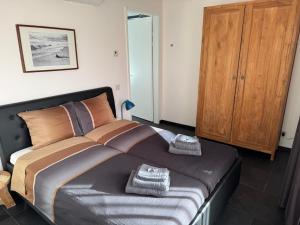 เตียงในห้องที่ Huisje36