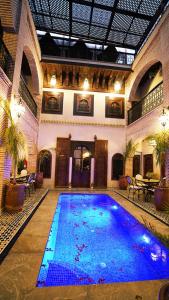 Bazén v ubytování Riad Touhfa Kasbah Marrakech nebo v jeho okolí