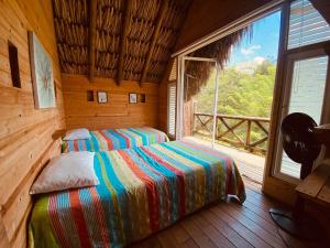 Postel nebo postele na pokoji v ubytování Glamping Paihuen