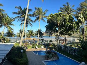 Kolam renang di atau dekat dengan Brisa do Mar Barê Praia Hotel - Praia de BAREQUEÇABA