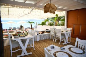 A restaurant or other place to eat at MyElla Boutique Hotel
