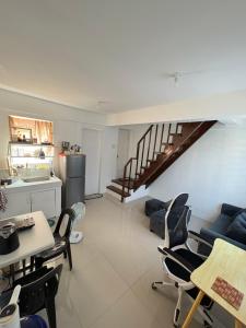 Χώρος καθιστικού στο Gensan Staycation Home +1 φωτογραφίες